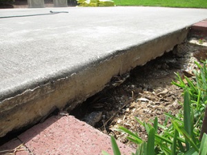 Loose soil around driveway