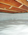 a moisture barrier installed on the walls and floors of a crawl space in Oak Ridge