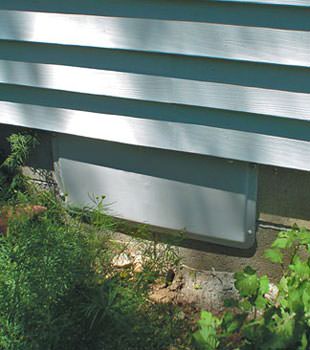 A gray crawl space vent cover in Farragut