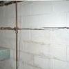 Severe foundation damage from a long crack in a bucking wall of a Maryville home.
