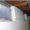 A foundation showing severe inward buckling along the windows in a Soddy Daisy home.
