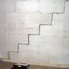 A diagonal stair step crack along the foundation wall of a Bristol home