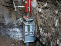 Foundation repair contractors lifting a structure in Chattanooga.