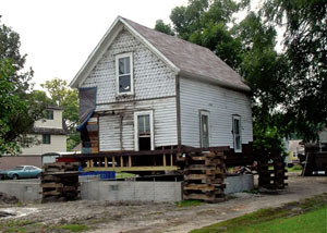 A severely damaged home foundation that is undergoing replacement in Elizabethton.