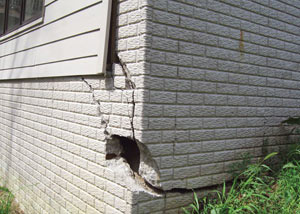 A severely damaged foundation wall in Ooltewah