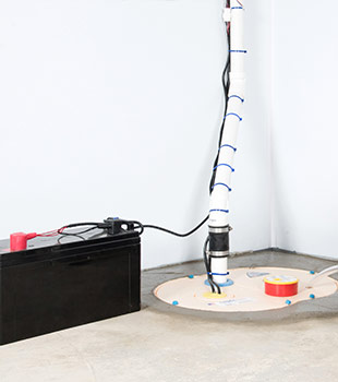 A sump pump installed in Oak Ridge by Master Services