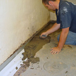 Testing a French drain system in a Morristown home.