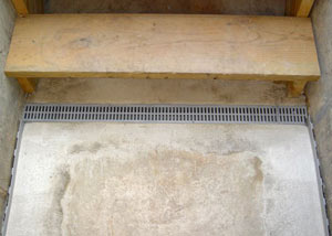Our grated drain system installed on a leaking basement staircase in Crossville.