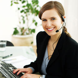 A disaster restoration customer service expert in Cleveland manning the phones