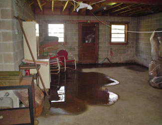 a flooded basement floor in a Harrison home