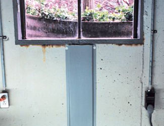 Repaired waterproofed basement window leak in Cleveland